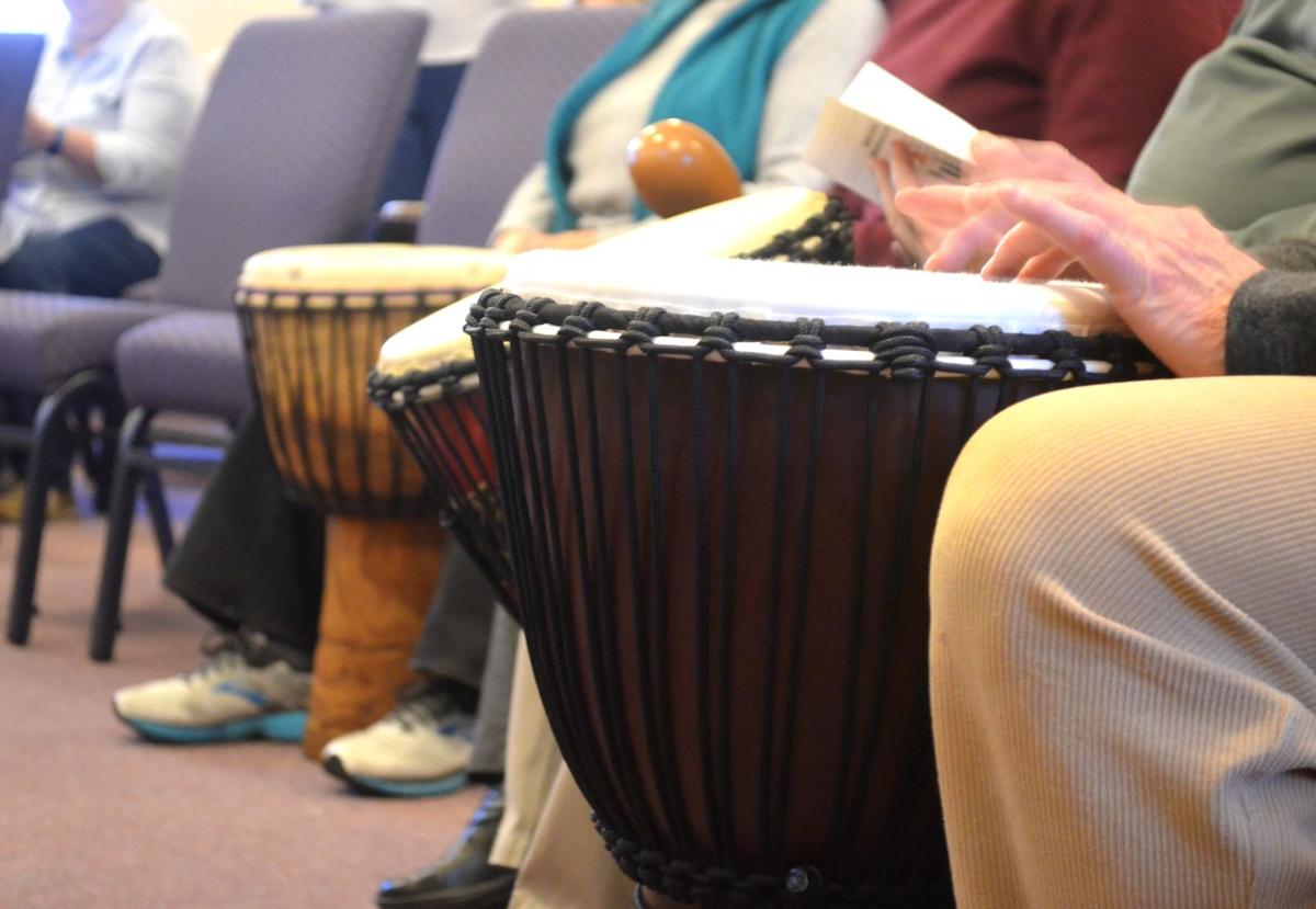 Drumming group delights dozens with a West African drumming